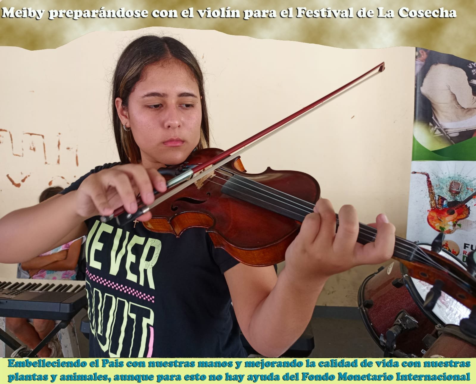 Meiby practicando violín